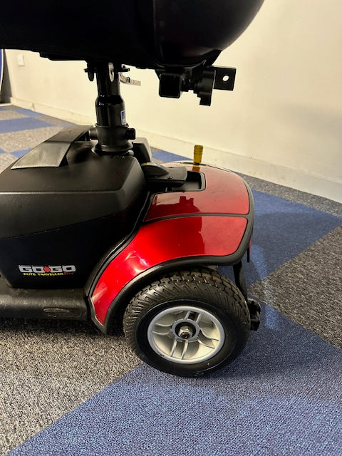 Pride Go-Go Elite Traveller Plus 4mph Mobility Boot Scooter in Red