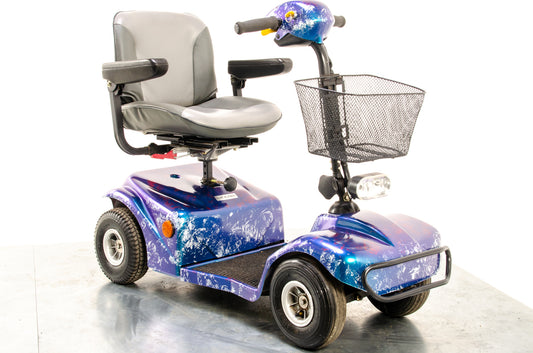 Rascal 388 S Used Electric Mobility Scooter Pavement Pneumatic Custom Blue Purple 1500